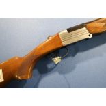Investarm 20 bore under and over folding action shotgun with 28 inch barrels, single trigger