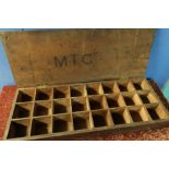 Rectangular wooden carrying case with hinged top, with multi-sectional interior for carrying glass