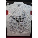 Framed & mounted signed Newcastle Falcons Northern Rock sponsored rugby jersey