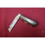 A. Wright and Son of Sheffield pocket knife with 2 1/2 inch folding gutting blade and wooden grips