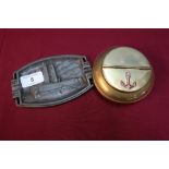 Brass circular ashtray/cigarette holder with hinged top with anchor and a cast alloy Souvenir De