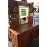 Early 20th C oak dresser with raised bevelled edge mirrored, back above two drawers and two cupboard