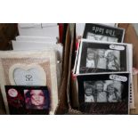 Ex shop stock free standing photograph frames in two boxes