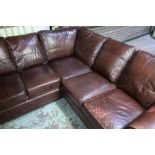 Modern corner fitting settee upholstered in brown leather