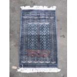 Traditional pattern Middle Eastern rug, blue grey ground (59cm x 107cm)