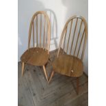Pair of Ercol light elm stick back dining chairs