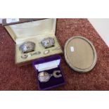 Cased pair of silver plated salts, an oval silver hallmarked framed photo frame and a Irish silver