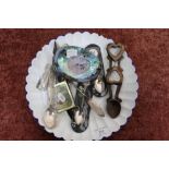 Stained beech Welsh loving spoon, a selection of Women's Institute souvenir spoons, two plated