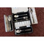 Cased Sheffield silver hallmarked spoon and fork set, another cased silver hallmarked spoon, two