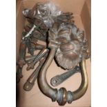 Heavy bronze lion mask doorknocker and a selection of brass carpet runner fixings No. 22250