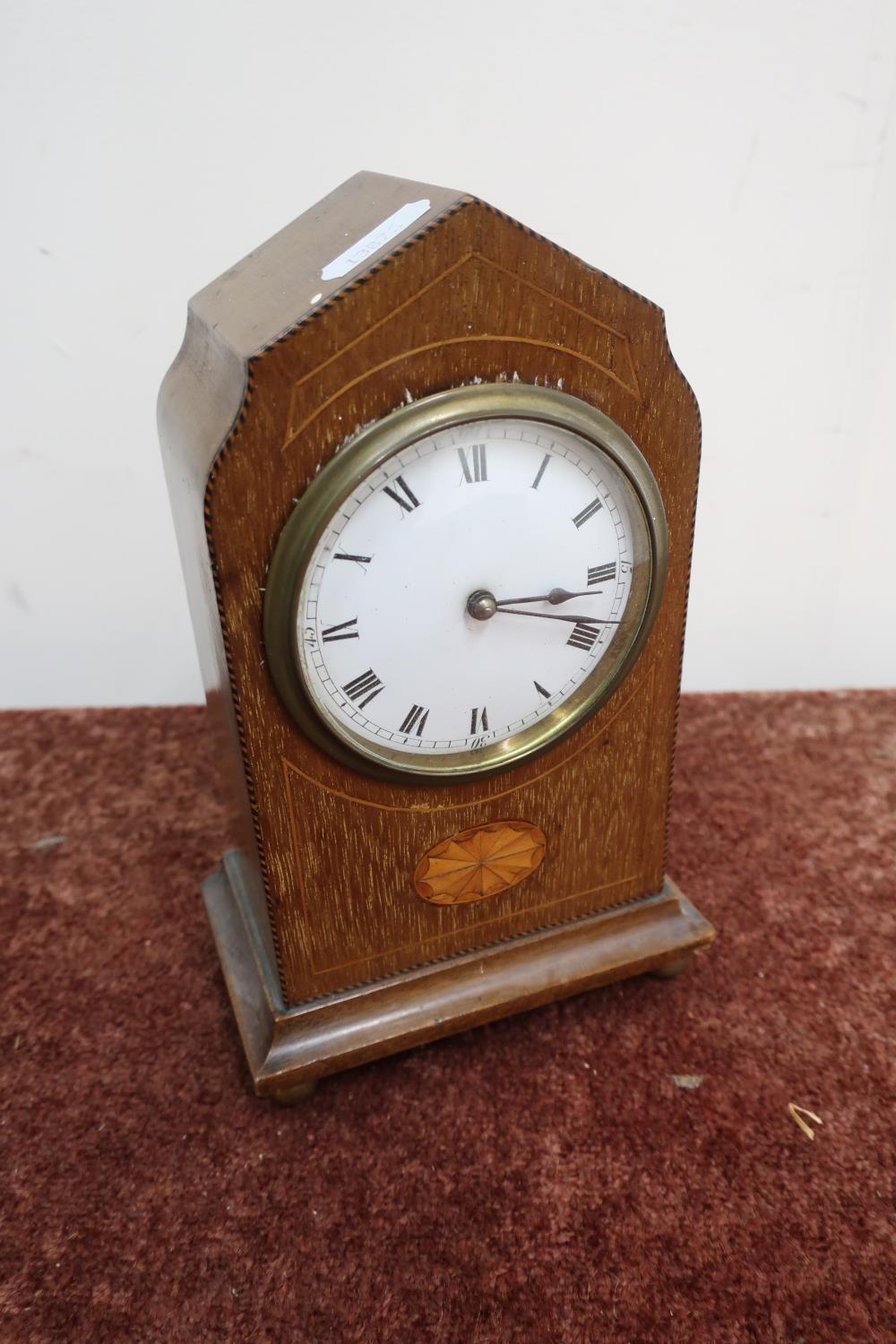 Edwardian inlaid mahogany time piece with white enamel dial, satinwood inlay, shell motif, brass