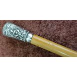 Victorian Malacca walking cane with Indian white metal top embossed with various figures (overall