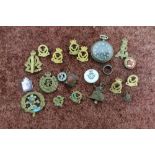 Royal Air Force sweetheart brooch, a South Lancashire Prince of Wales Own cap badge, a selection