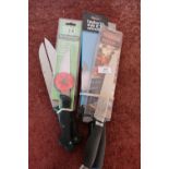 Two sealed as new Taylor Eye Witness kitchen knives, a Tesco Finest as new bread knife, a Sabatier