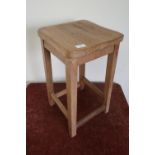 Light wood four legged stool