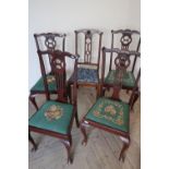 Set of five Edwardian mahogany dining chairs with drop in wool-work seats and pad feet