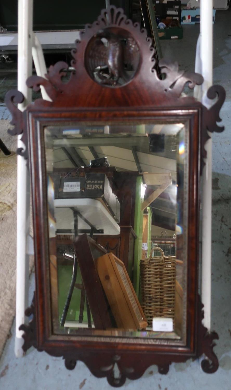 19th C mahogany bevelled edge rectangular wall mirror, with fretwork detail and crested with profile