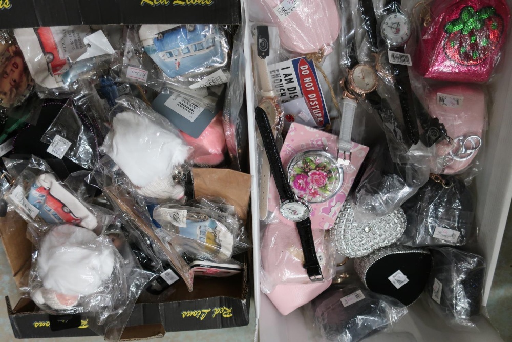 Ex shop stock fashion watches, heart shaped trinket dishes, and keyrings in two boxes