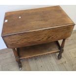 Ercol two tier drop-leaf trolley with single frieze drawer