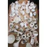 Approximately fifty pieces of souvenir crested china including one from the British Empire