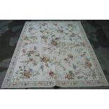 Country House style cotton type rug beige ground with floral pattern motifs and floral border (240cm