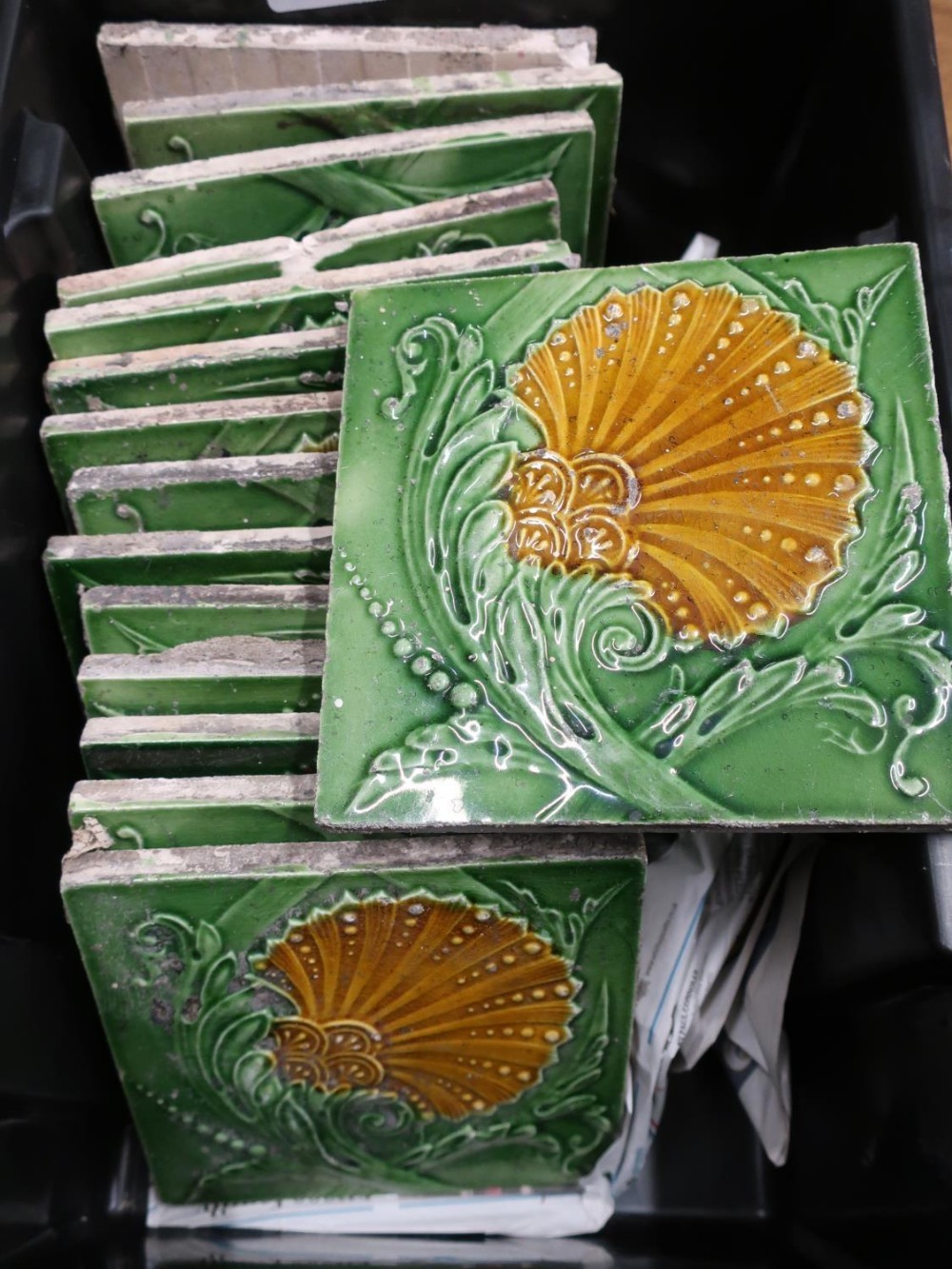 Fifteen assorted 19th/20th C green glaze floral pattern ceramic wall tiles