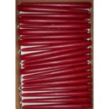 Approximately 200 boxed as new dark red tapered dining candles