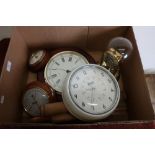 Selection of various wall clocks, rolling pins and other items in one box