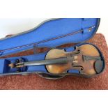 Wooden cased violin and bow with internal paper label for ATS Stradiuarius