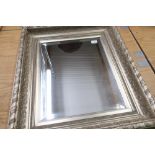 Victorian style rectangular bevel edged mirror in ornate silvered frame