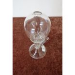 19th C glass lace makers oil lamp with circular base, loop handle, and globe (approx height 25cm)