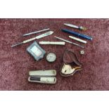 Late 19th C Stanhope in the form of a fountain pen, a Stanhope needle case, a silver hallmarked