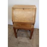 Small walnut bureau with fall front revealing fitted interior of single drawer (width 53cm)