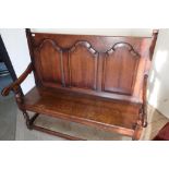 Oak triple panelled back hall bench/settle on turned supports with planked seat (width 135cm)