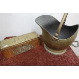 Brass coal helmet and an embossed brass candle box