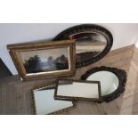 Oval bevel edged wall mirror, an oval mirror with carved wood frame, two gilt framed mirrors and a