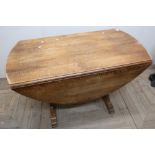 Oak drop-leaf dining table (length 110cm)