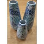 Pair of ex shop stock blue tear drop vases and a similar smaller vase
