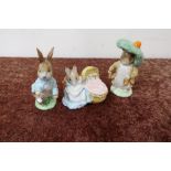 Royal Albert Beatrix Potter Hunca Munca figure, a Royal Albert Benjamin Bunny and a Beswick Peter