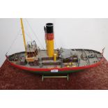 Kit built wooden model of a steam tug