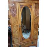 19th/20th C walnut single mirrored door wardrobe with drawer to the base and matching dressing chest