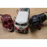 Ex shop stock illuminated mirrored skull, a tin-plate style split screen VW Camper Van and a bulldog