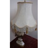 Neoclassical design painted and gilded table lamp with tasselled shade