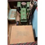 Tin-plate model of a vintage John Deer tractor, a boxed ERTL classic vehicle, various books, records
