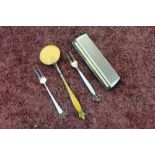 White metal and enamel mounted Ivory comb, two Norwegian silver & enamel pickle forks , and a