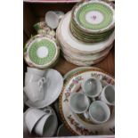 Green gilt and floral pattern part tea service, various coffee cans and other part services