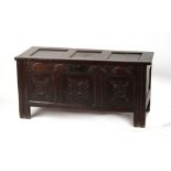 Property of a gentleman - a late 17th century carved oak coffer with three panel top, 48.4ins. (