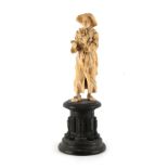 Property of a lady - a late 19th century Continental carved ivory figure of a standing missionary,