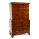 Property of a gentleman - an early 18th century George II walnut & featherbanded chest-on-chest or