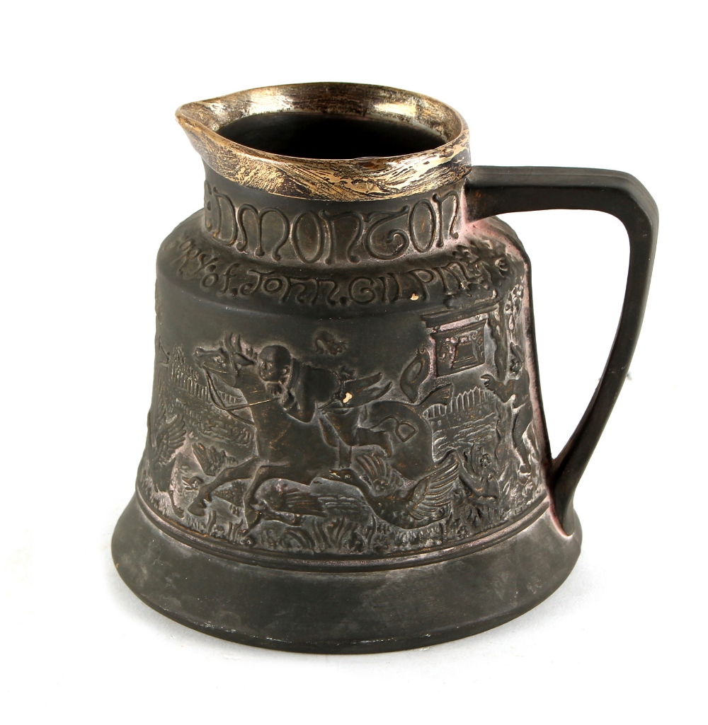 Property of a deceased estate - an early Macintyre black pottery bell shaped jug, decorated in
